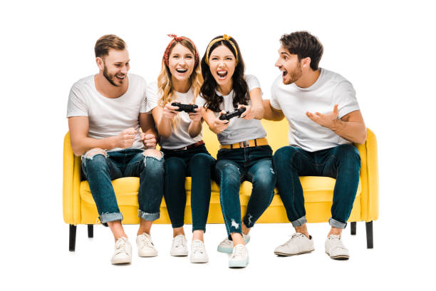 istock young men looking at excited attractive women playing with joysticks isolated on white 1096023190
