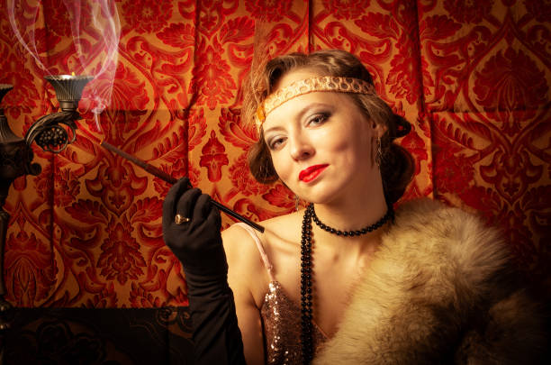 istock Girl in an evening dress with a cigarette 1096023536