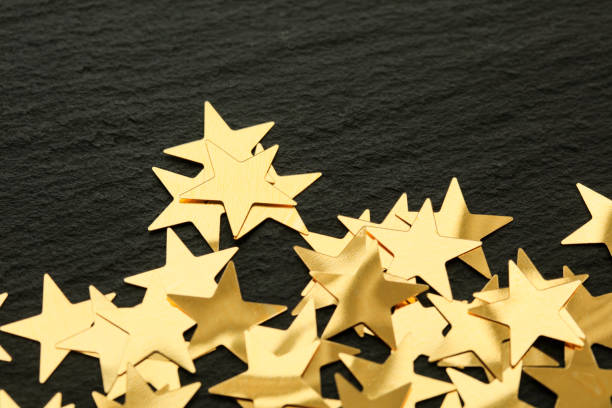 istock Golden stars on black background 1096024750