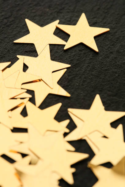istock Golden stars on black background 1096024910