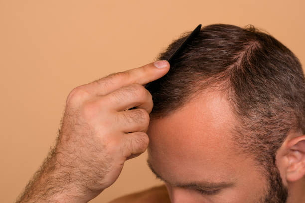 istock Close-up cropped view of nice attractive handsome brunet guy com 1096026210
