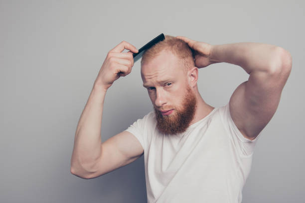 istock Portrait of nice-looking man stand isolated on light gray wall c 1096027984