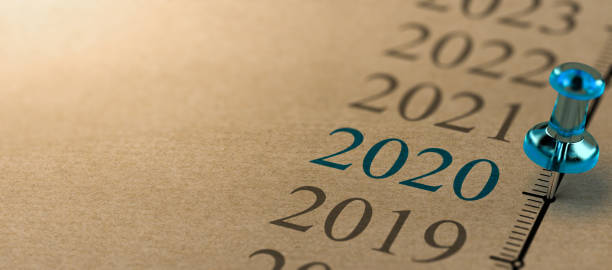 Year 2020, Two Thousand And Twenty Timeline 3D illustration of a timeline on kraft paper with focus on 2020 and a blue thumbtack. Year two thousand and twenty annual event photos stock pictures, royalty-free photos & images