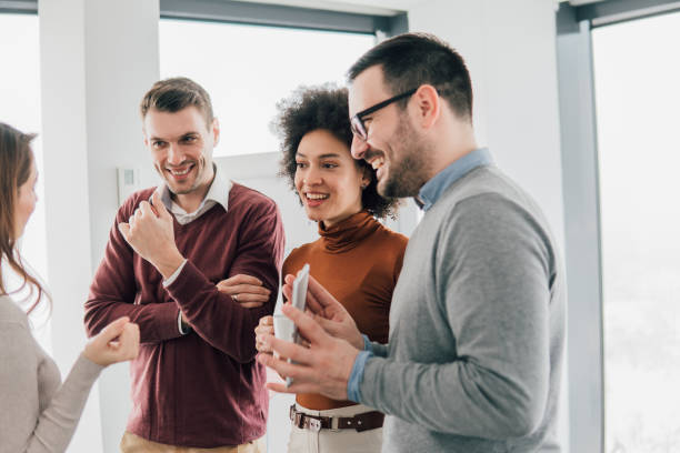 istock Happy business people looking at digital tablet 1096040114