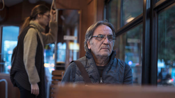 istock Old man sitting on the bus 1096040858