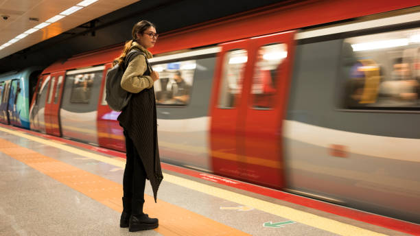 istock Woman is waiting for train in subway 1096040884