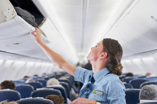istock Luggage safely stored in the overhead compartment? Check 1096043304