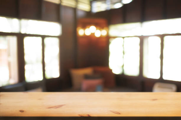 istock wooden table with blurred modern home background. 1096048014
