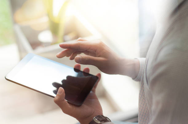 istock hands of gamer playing with smartphone device, technology concept. 1096048022