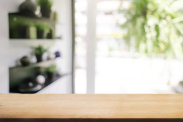 istock empty wood table with blur montage restaurant background 1096048066