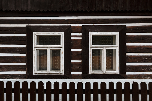 Windows of a traditional wooden cottage in a village of Turiec Region in northern Slovakia.\