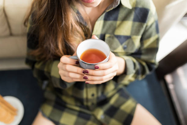 istock Woman With Painted Nails Enjoying Coffee 1096067320