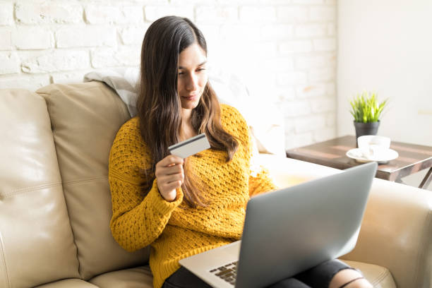 istock Woman Making Purchase Payment In Living Room 1096070066