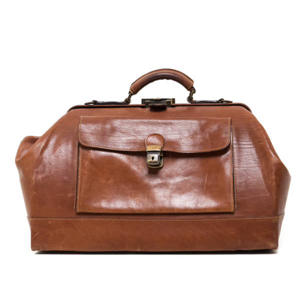istock old brown vintage stylish suitcase isolated on white background 1096077002