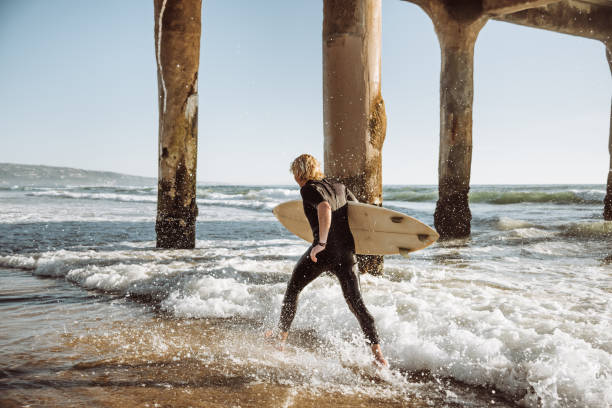 istock surfer man on huntington beach california 1096080690