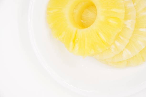 istock Pineapple slices in sweet syrup 1096081976