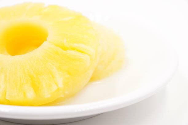 istock Pineapple slices in sweet syrup 1096083862