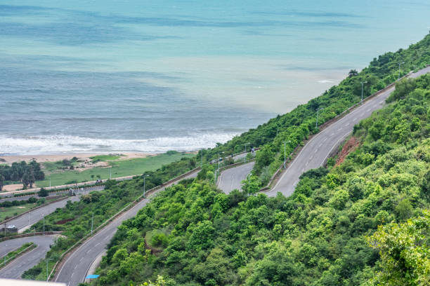 istock Vehicles are crossing to a multi layer road going on a mountain looking awesome with beach background. 1096085886