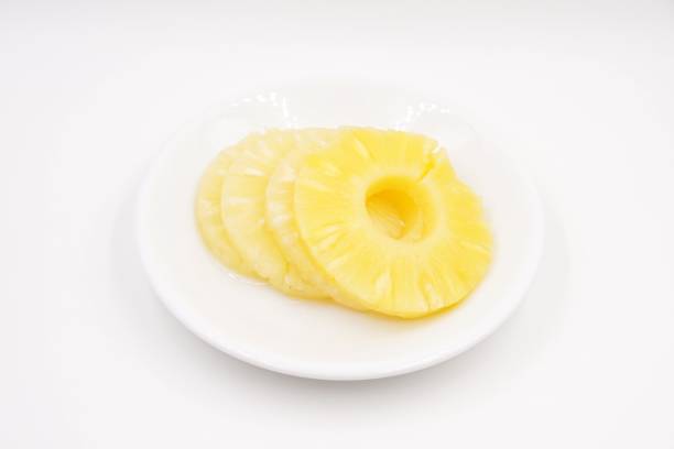 istock Pineapple slices in sweet syrup 1096088706