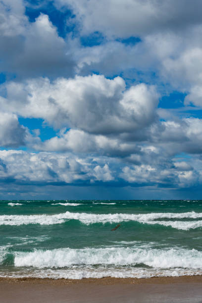 Dramatic cloudscape sky over wild windy Autumn seas at Newquay Cornwall on an early October day.