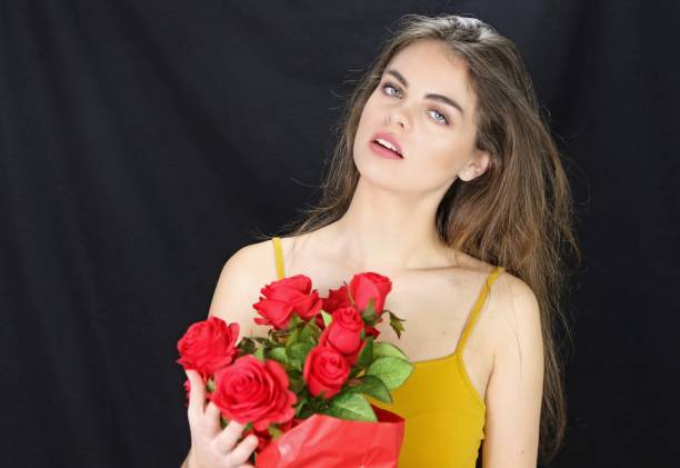 istock Woman And Roses 1096096060