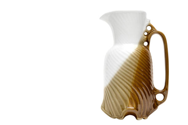 istock retro ceramics Water jug isolated on a white background 1096099266