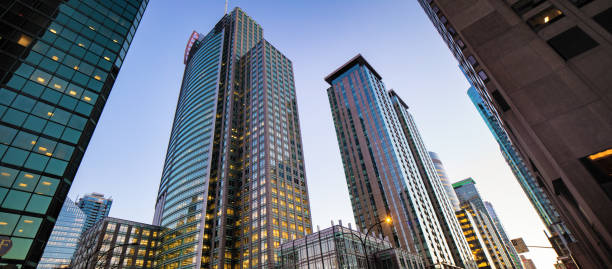 Downtown Montreal modern buildings low angle panoramic view Downtown Montreal modern buildings low angle panoramic view highrise condominiums stock pictures, royalty-free photos & images