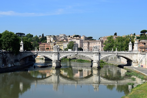 Bridge with reflection over Tiber