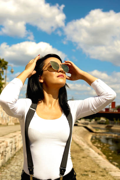istock Beautiful woman near the river 1096113510