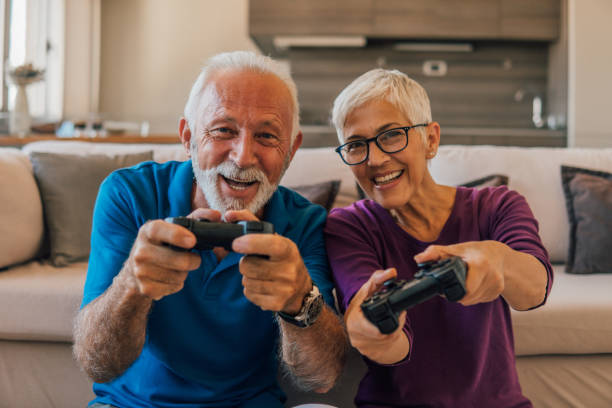 istock Senior couple playing games and smiling 1096116908