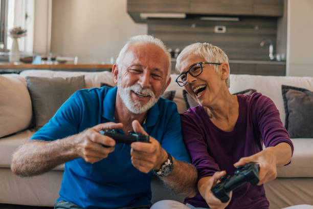 istock Smiling couple playing video games 1096117084