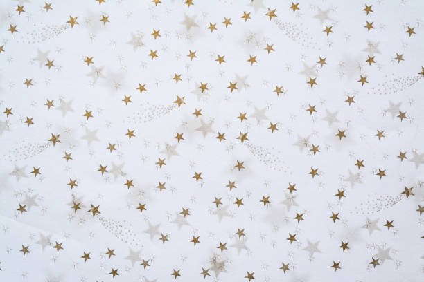 istock Abstract background with golden stars on a white background 1096117596