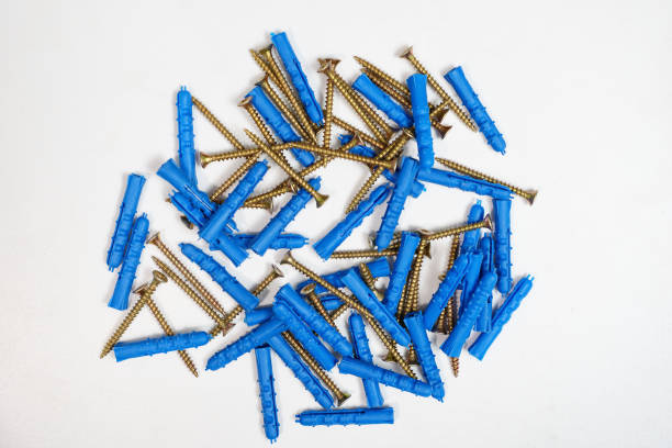 istock Plastic dowel pin or wall plugs on white background 1096127286