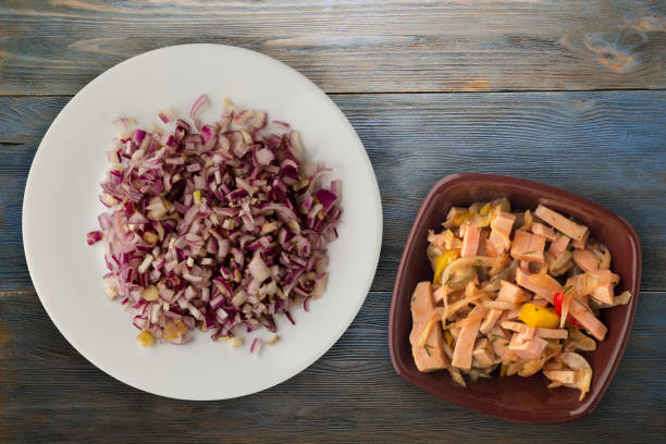 istock red onion on a wooden background 1096137866