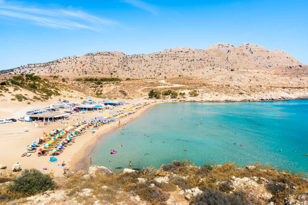 istock Agathi beach with holiday makers enjoying their time (Rhodes, Greece) 1096157296