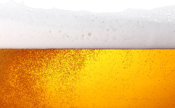 istock Close up background of beer with bubbles in glass 1096169074