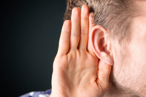 close up photo of person have ear hearing problems isolated