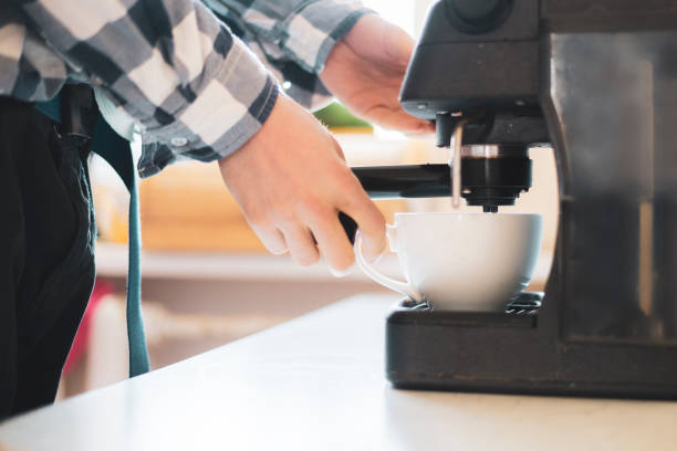 istock person use coffee machine to make fresh espresso  f 1096225156