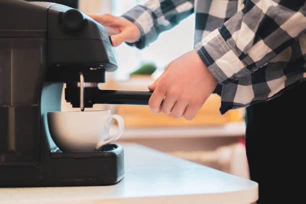 istock person use coffee machine to make fresh espresso  f 1096225298