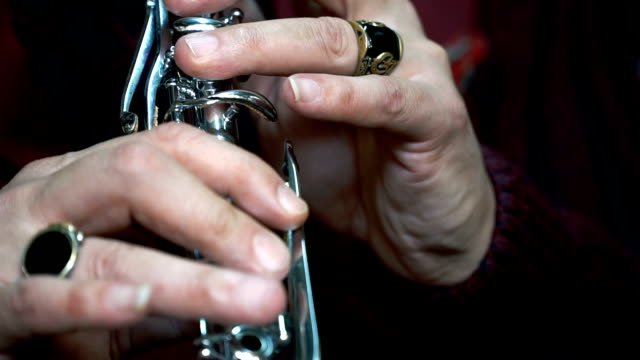 Man Playing Clarinet