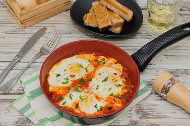 istock Shakshuka. Eggs in tomato sauce for breakfast. 1096254814