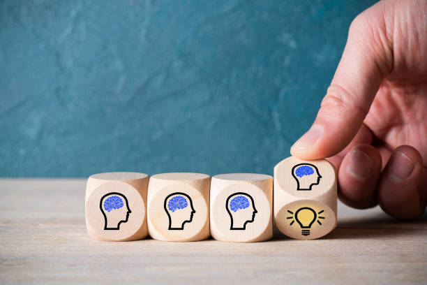 istock many people together having an idea symbolized by icons on cubes 1096254864