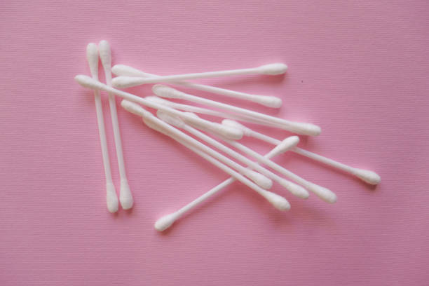 istock white plastic cotton buds on a pink background 1096254942