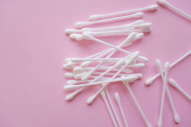istock white plastic cotton buds on a pink background 1096254956