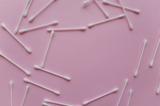 istock white cotton buds with with a space for a text,  on a pink background 1096255090