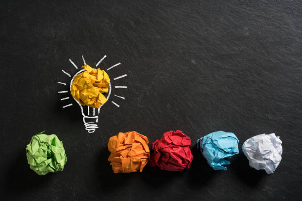 istock crumpled paper symbolizing different solutions with one standing out on a slate background 1096257912
