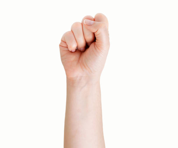 hand symbol Woman fist up a white isolated background strike protest action photos stock pictures, royalty-free photos & images