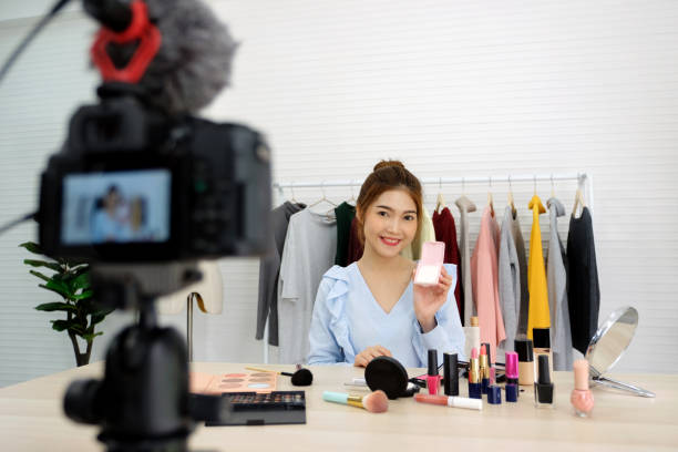 istock Young asian woman beauty blogger showing how to make up video tutorial recording by camera, vlog concept, beauty fashion people and technology communication 1096264176