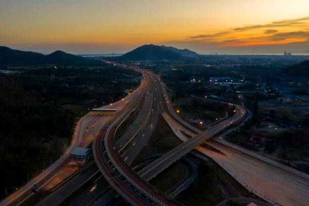 istock Aerial view. Highway intersections and traffic at twilight 1096314020