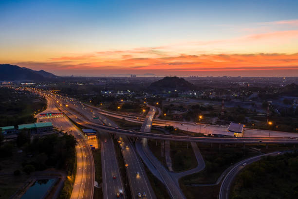 istock Aerial view. Highway intersections and traffic at twilight 1096315556